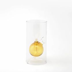 Yellow blown glass oil lamp